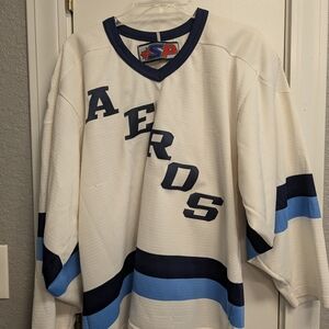 White and Blue Kyle Wanvig Houston Aeros Hockey Jersey Autographed By The Team